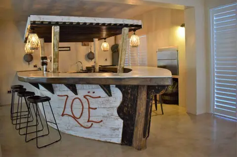 The Zoe boat-bar, built from a restored boat